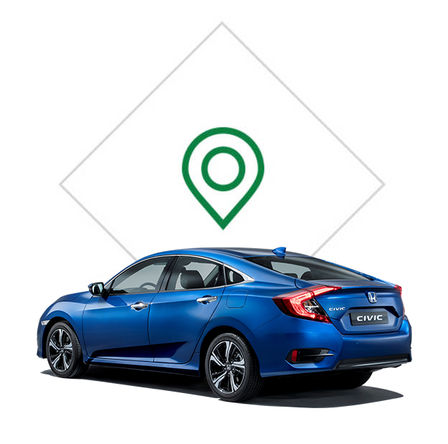 Honda Civic 4-dørs med billede af forhandler, set skråt bagfra.