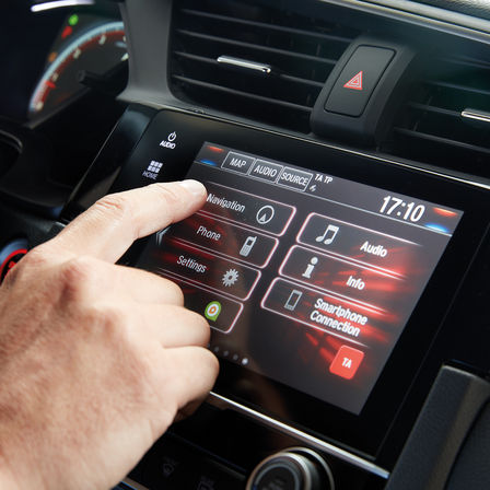 Nærbillede af Honda CONNECT-infotainmentsystem.