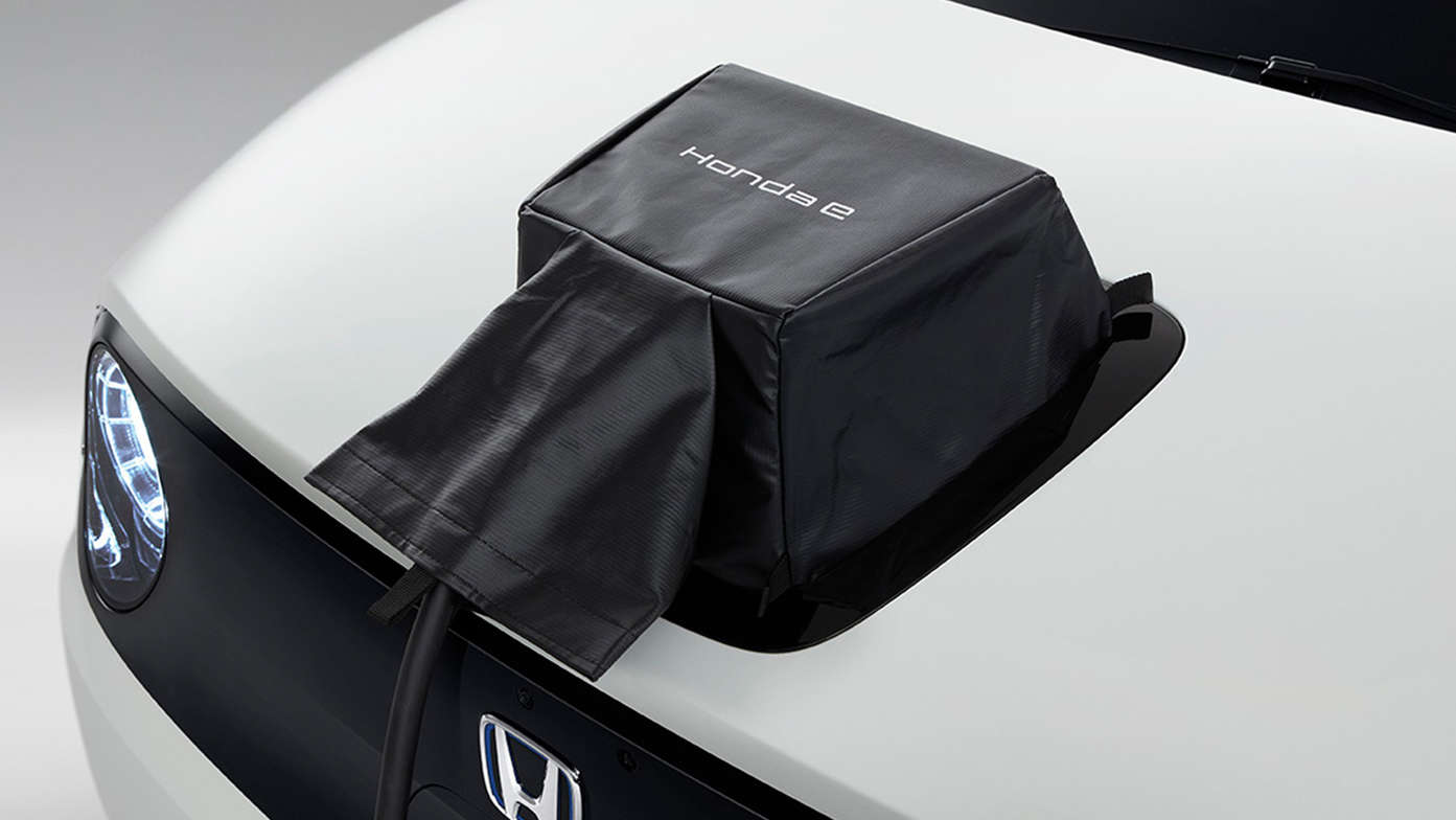 Nærbillede af Honda e Power Charge, overtræk til ladedæksel.