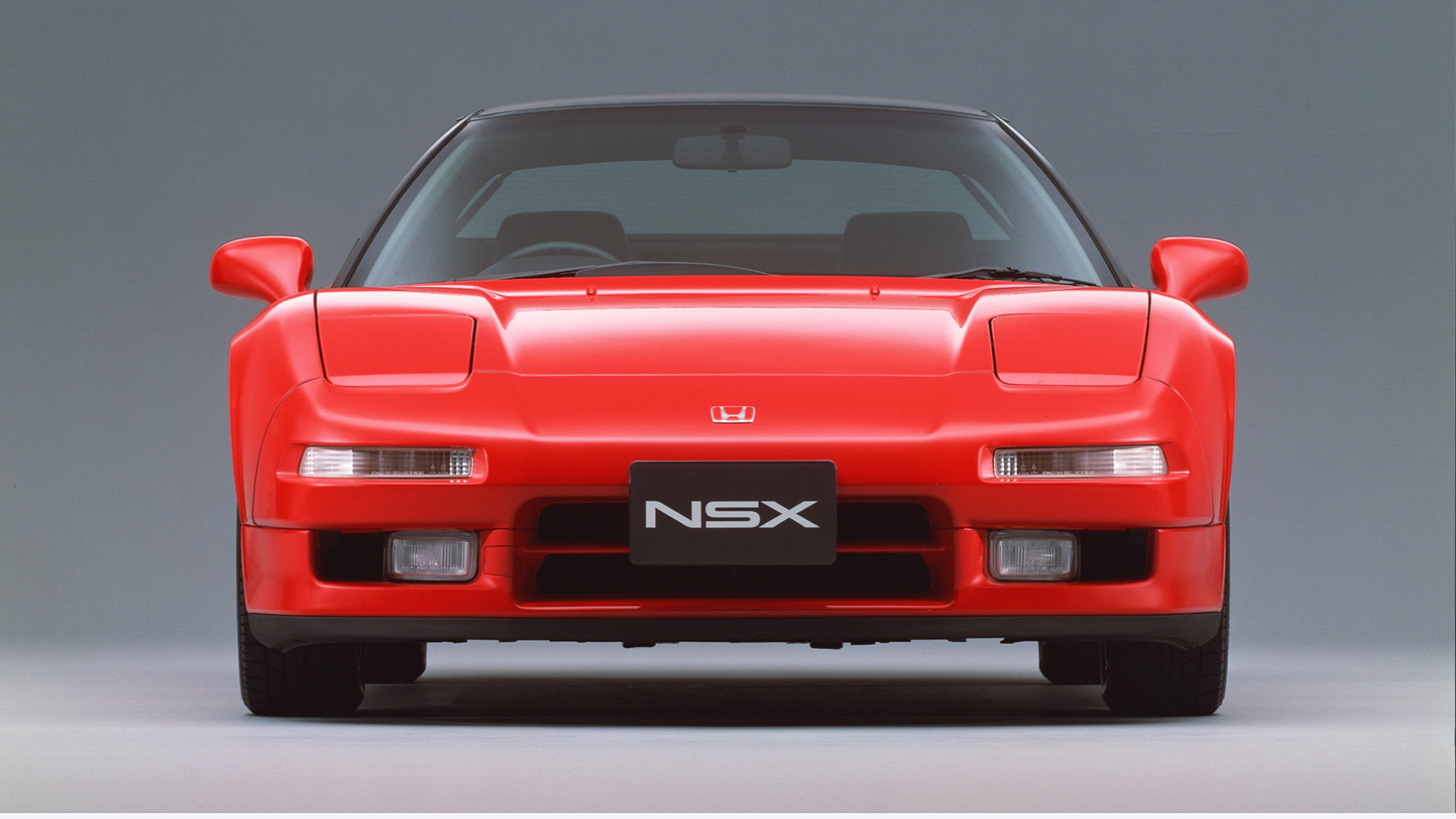 Studiefoto af Honda NSX, set forfra.