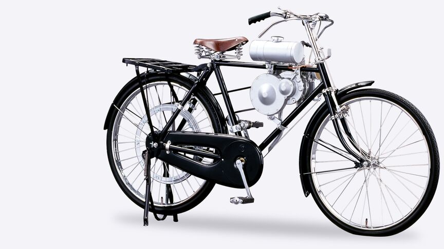 Honda Type A-cykel med en ombygget strømgenerator, set fra siden.